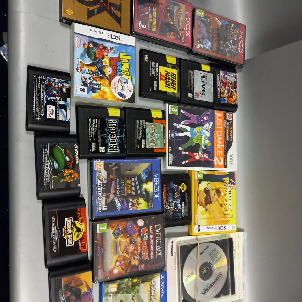 ASSORTED VIDEO GAMES TO INCLUDE PSVITA UNCHARTED, MEGA DRIVE JURASSIC PARK, AND EVERCADE WORMS ETC..