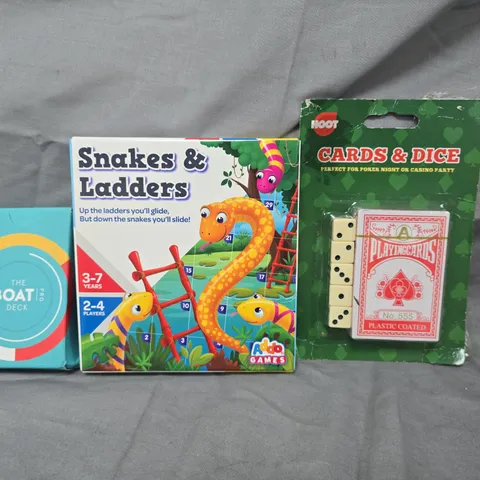 APPROXIMATELY 10 ASSORTED TOYS AND GAMES TO INCLUDE SNAKES & LADDERS, CARDS & DICE, ETC