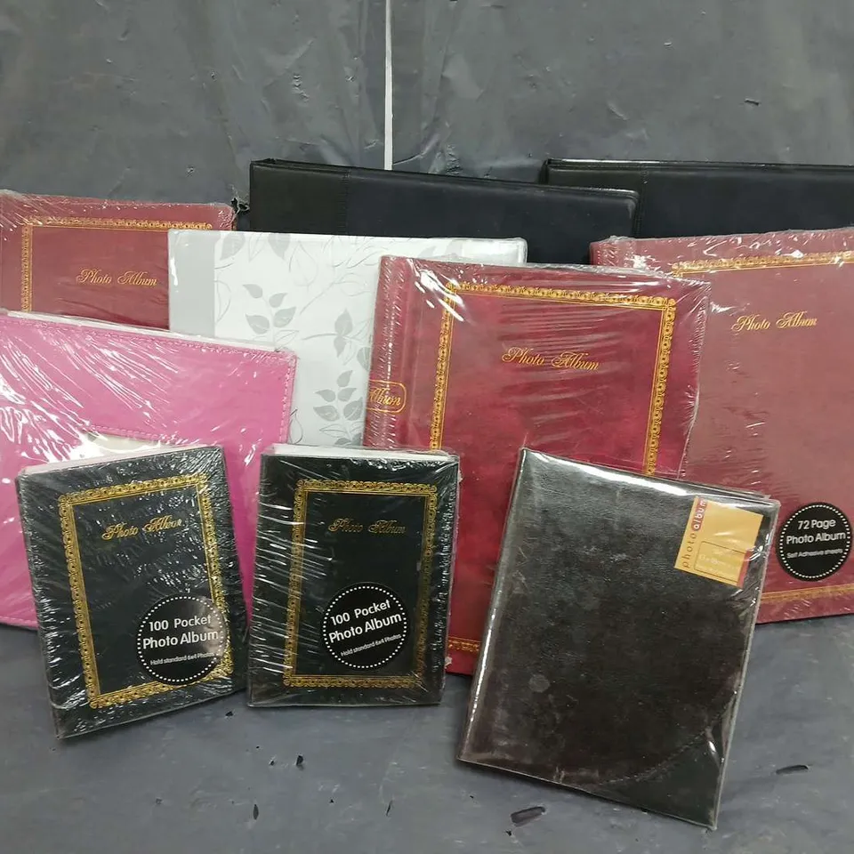 APPROXIMATELY 10 ASSORTED PHOTO ALBUMS AND BUSINESS CARD BOOK