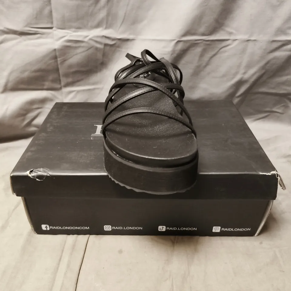 BOXED PAIR OF RAID LONDON PLATFORM STRAPPY SANDALS IN BLACK SIZE UK 9