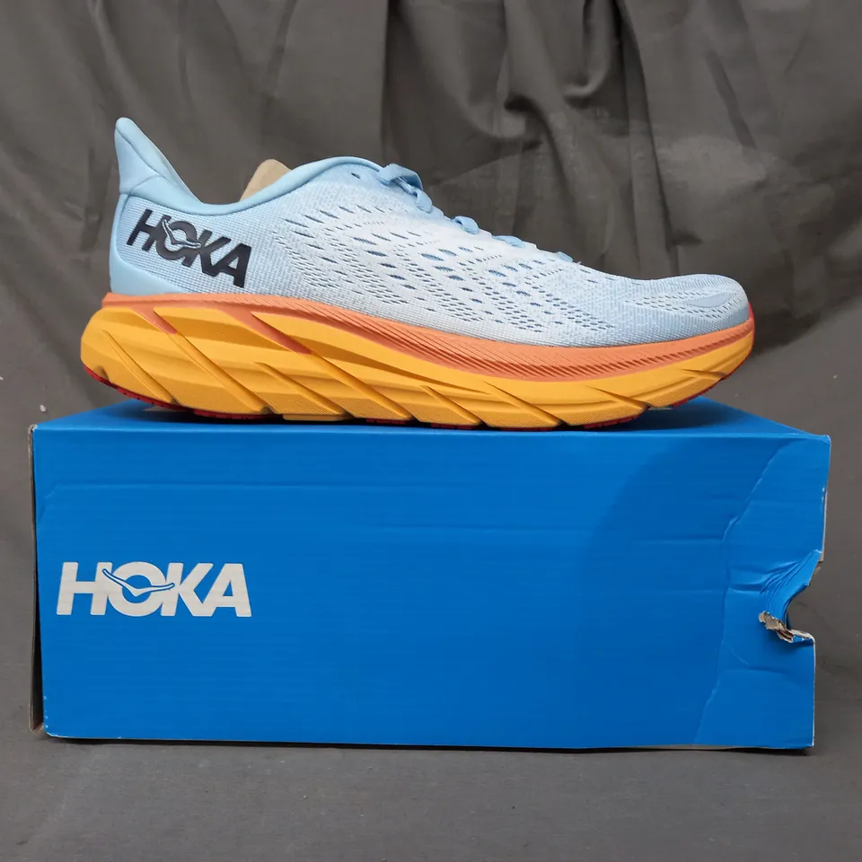 BOXED PAIR OF HOKA CLIFTON 8 SHOES IN LIGHT BLUE/ORANGE UK SIZE 7.5