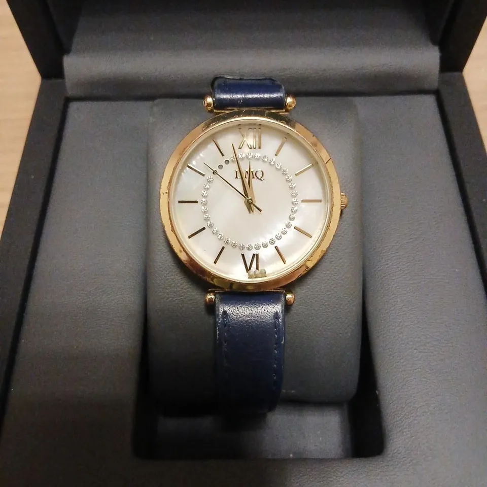 DIAMONIQUE MOTHER OF PEARL LEATHER STRAP WATCH 