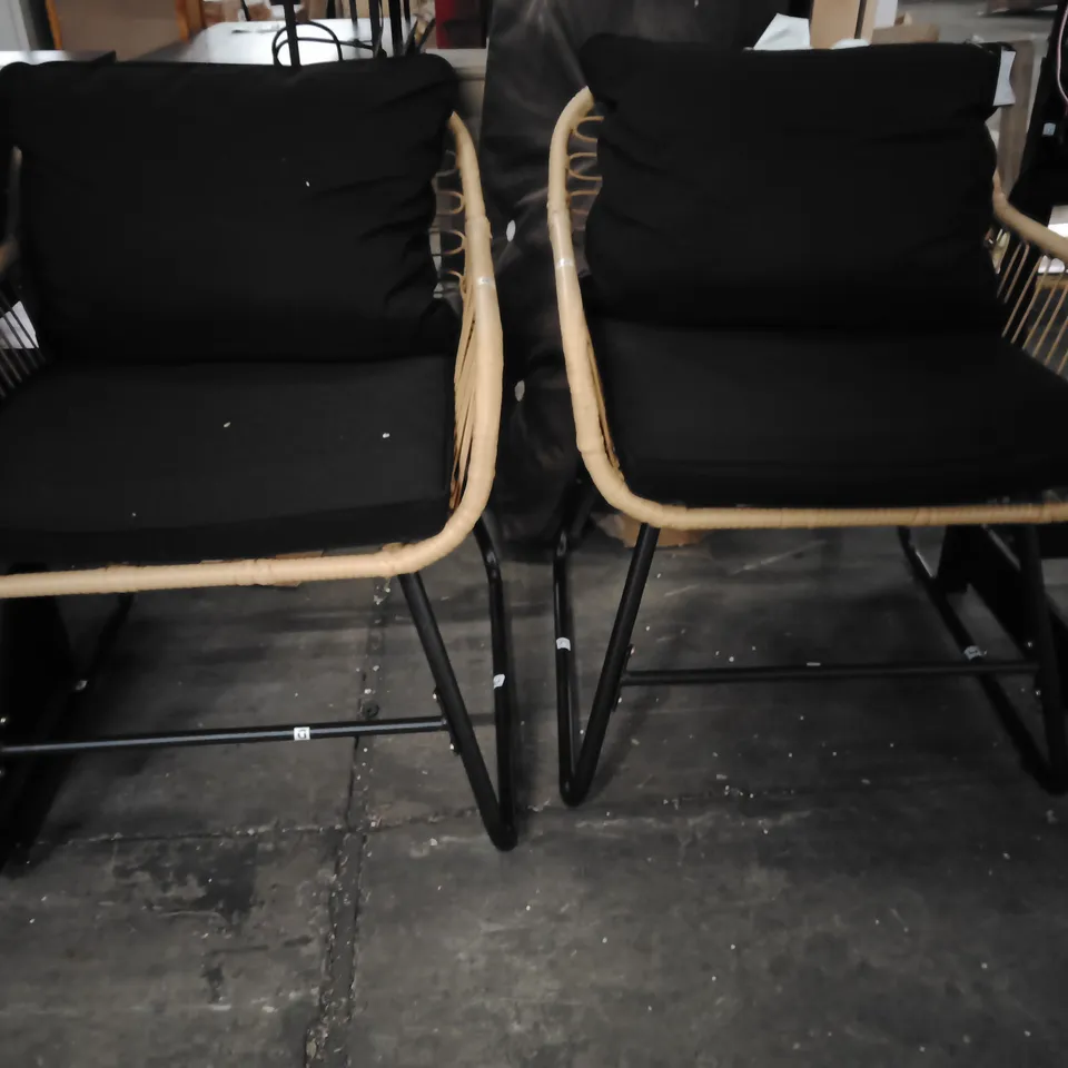 PAIR OF RATTAN-STYLE DINING CHAIRS WITH BLACK CUSHIONS (SET OF 2)