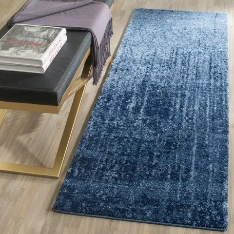 KISSLING HAND WOVEN AREA RUG APPROXIMATELY 60X243CM