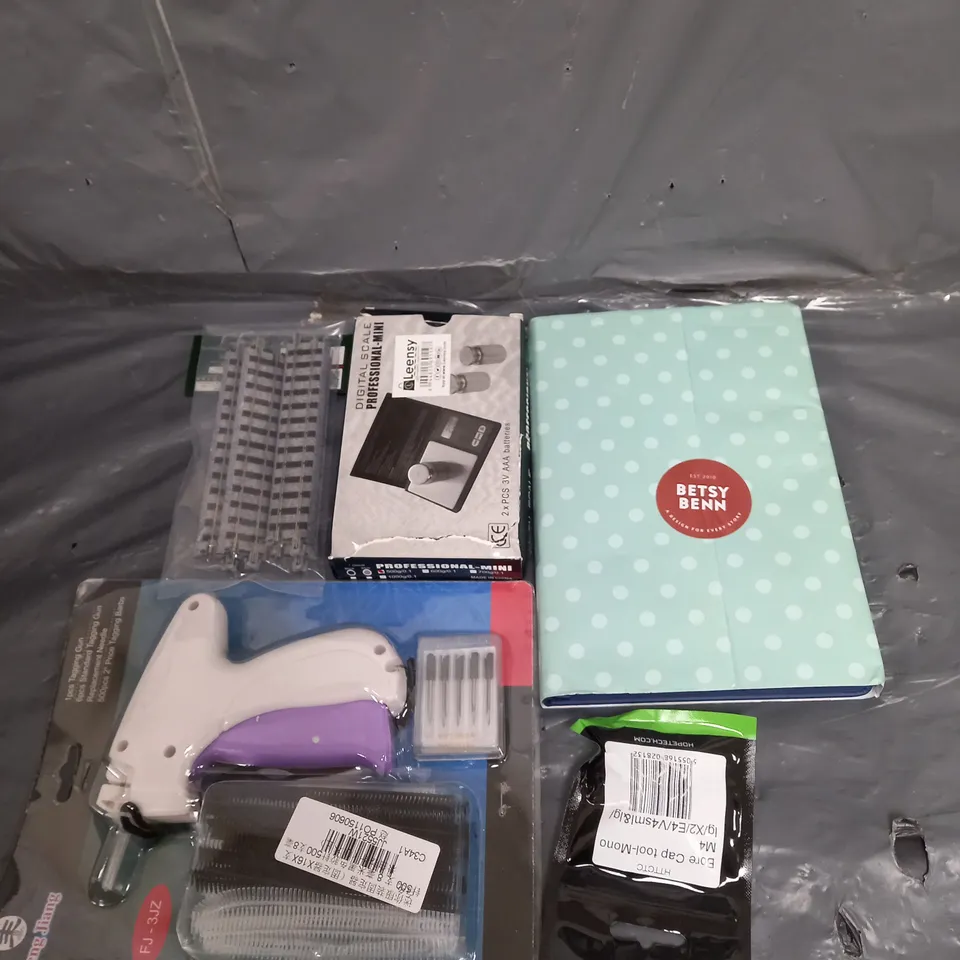 APPROXIMATELY 10 ASSORTED HOUSEHOLD ITEMS TOO INCLUDE, SCALES `, NOTE BOOKS , TAGGING GUN , ETC 