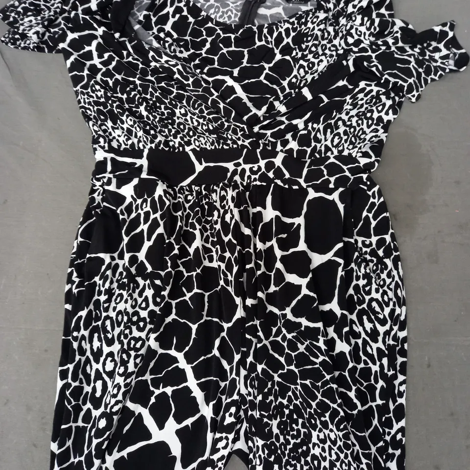 JULIEN MACDONALD JUMPSUIT IN BLACK/WHITE GIRAFFE PATTERN SIZE 10