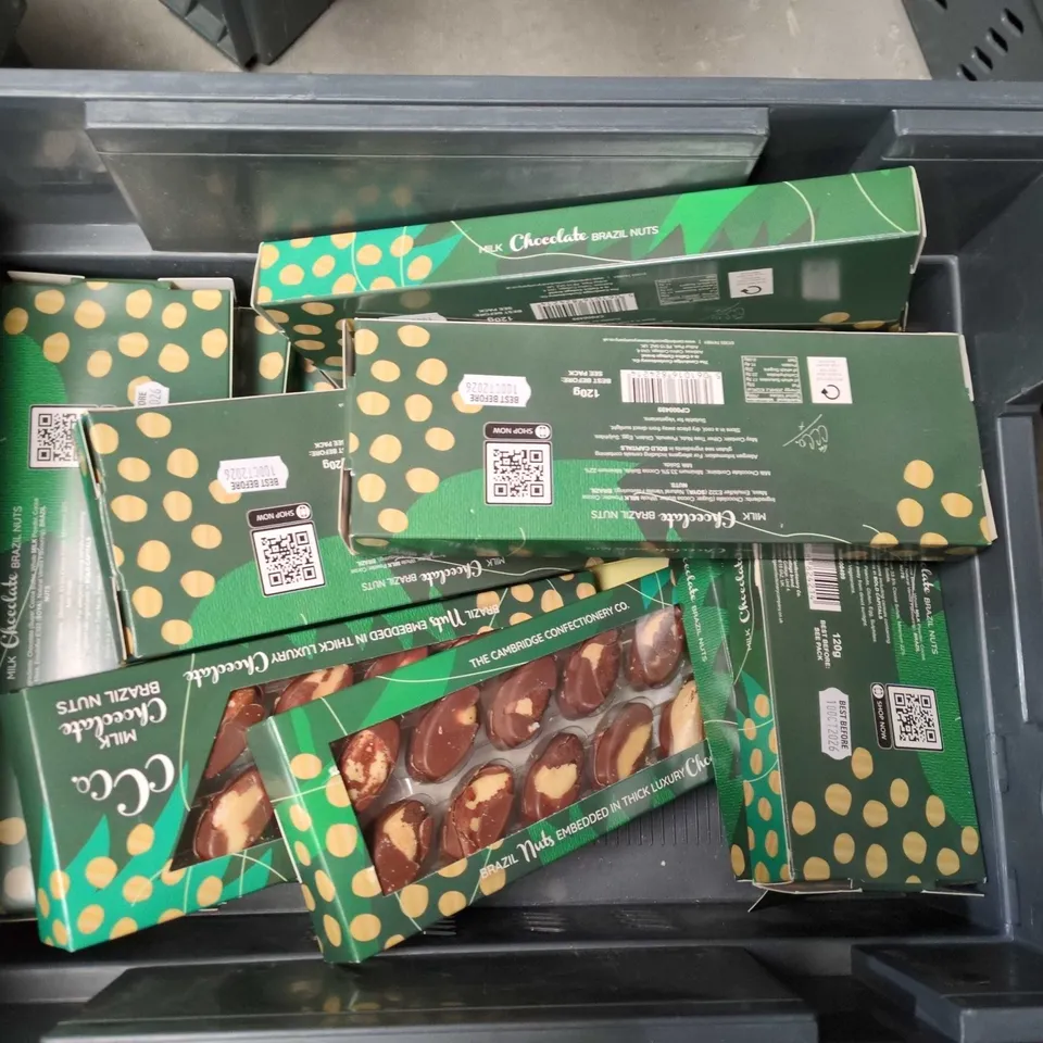APPROXIMATELY 12 PACKS OF THE CAMBRIDGE CONFECTIONERY CO MILK CHOCOLATE BRAZIL NUTS 120G PER PACK