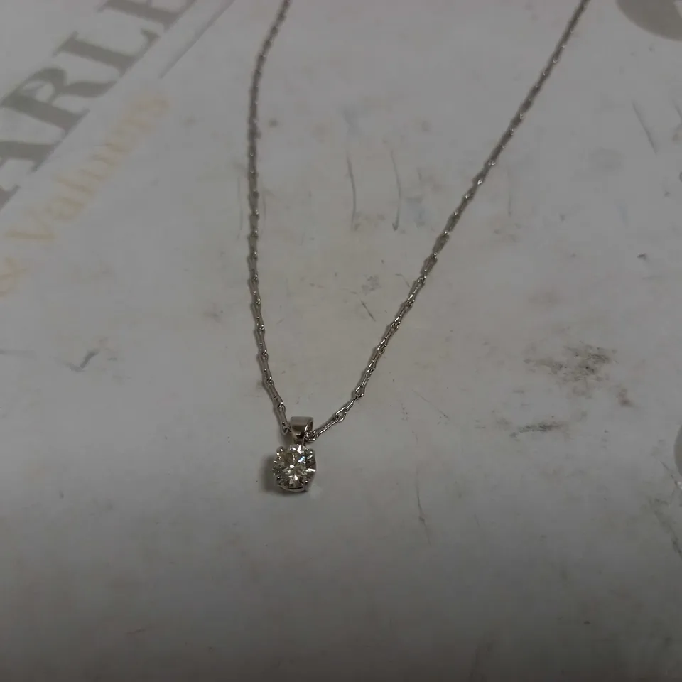 DESIGNER 18CT WHITE GOLD PENDANT ON CHAIN SET WITH A DIAMOND WEIGHING +-0.52CT