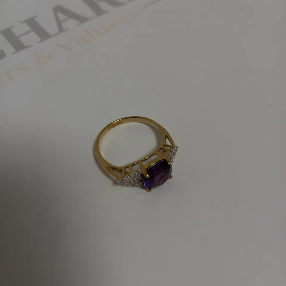 DESIGNER 9CT GOLD RING SET WITH A CUSHION CUT AMETHYST AND DIAMONDS WEIGHING +-1.58CT