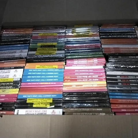 APPROXIMATELY 100 ASSORTED CDS AND DVDS TO INCLUDE NOW MUSIC 18, NOW YEARBOOK, AND NOW THAT'S WHAT I CALL ETC.