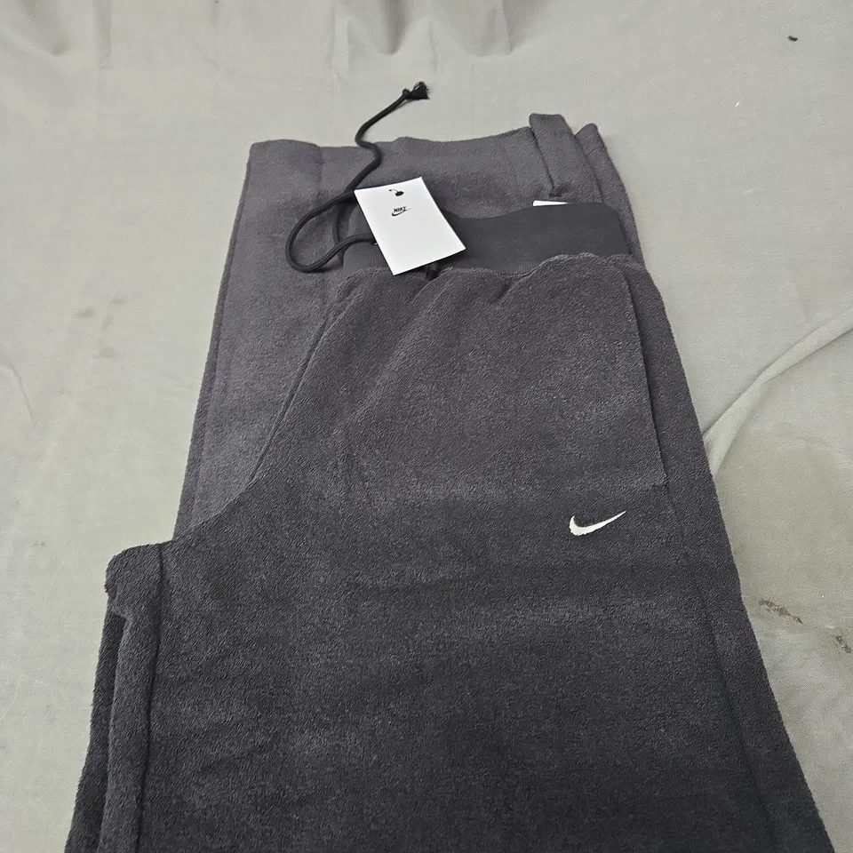 NIKE LOGO FLEECED TRACKSUIT BOTTOMS SIZE M 