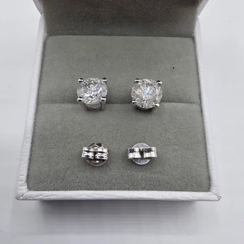 18CT WHITE GOLD STUD EARRINGS SET WITH NATURAL DIAMONDS WEIGHING +-3.01CT