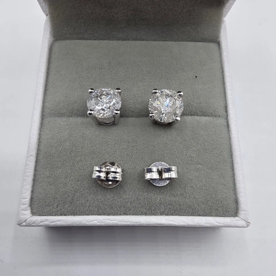 18CT WHITE GOLD STUD EARRINGS SET WITH NATURAL DIAMONDS WEIGHING +-3.01CT