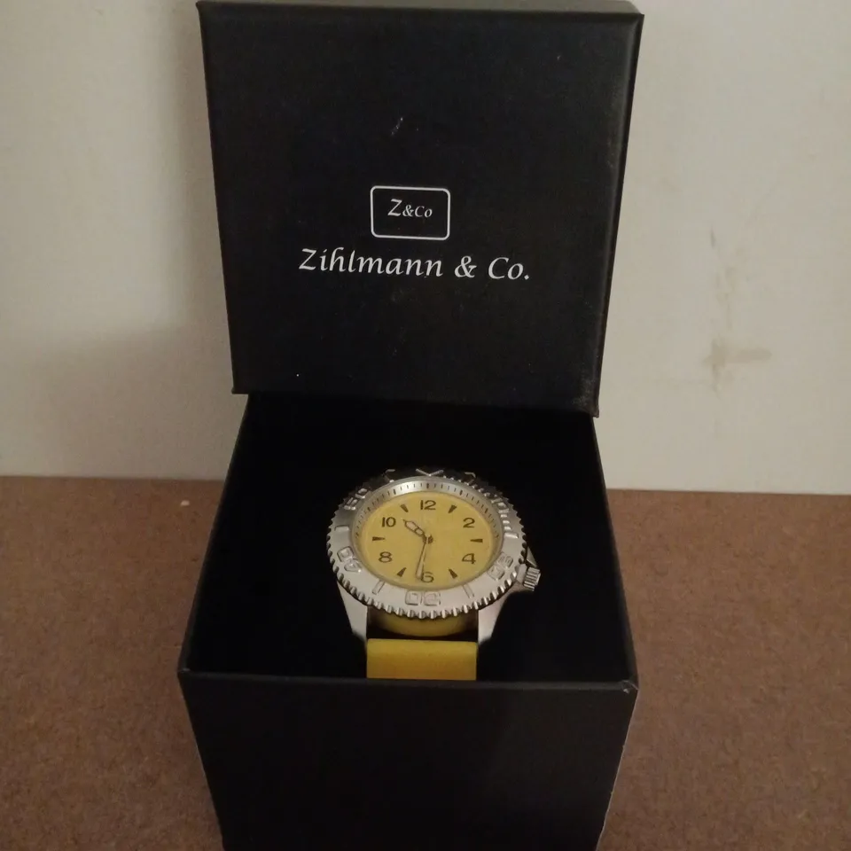 ZIHLMANN & CO STAINLESS STEEL WATCH WITH YELLOW FACE & YELLOW RUBBER STRAP