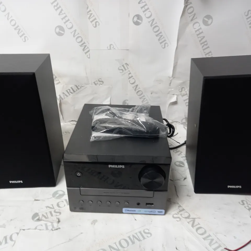 BOXED PHILIPS MUSIC SYSTEM AND SPEAKERS