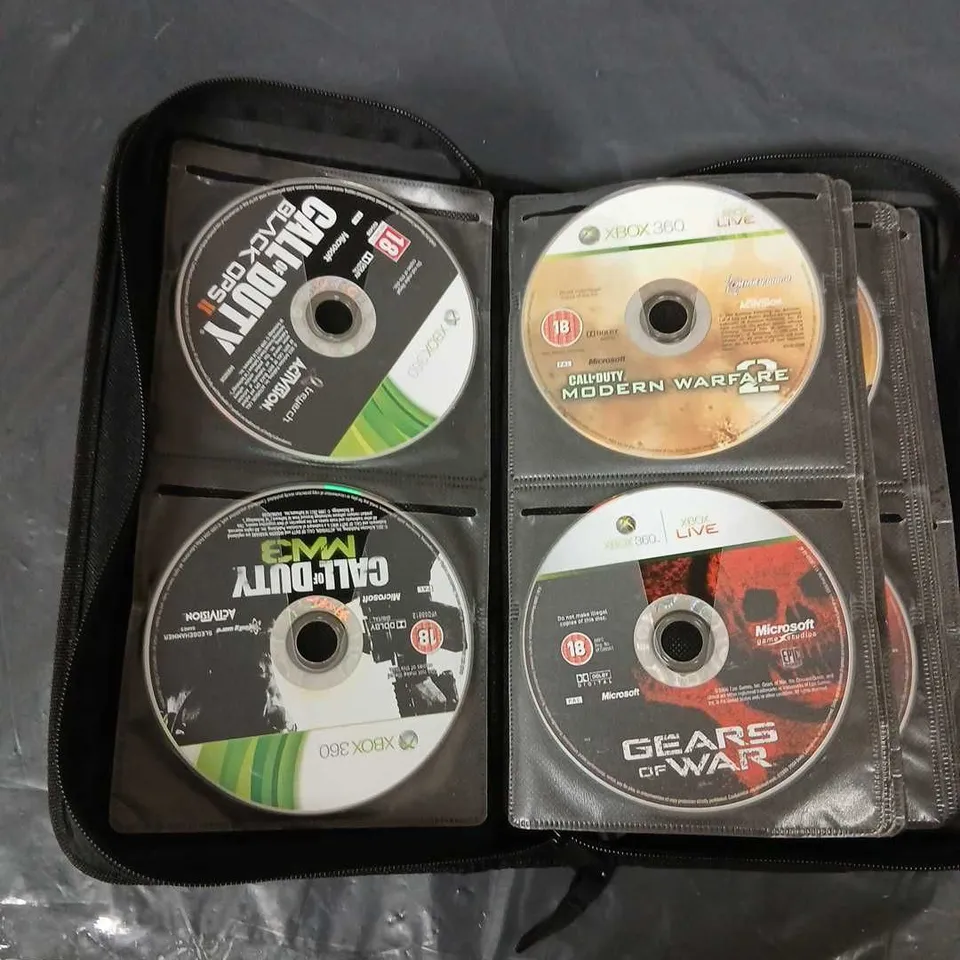CD/GAME WALLET WITH APPROXIMATELY 50 ASSORTED XBOX 360 GAMES