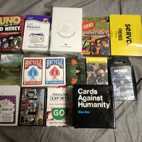 ASSORTED CARD GAMES & PLAYING CARDS TO INCLUDE UNO, BICYCLE, CARDS AGAINST HUMANITY, GCSE REVISION CARDS