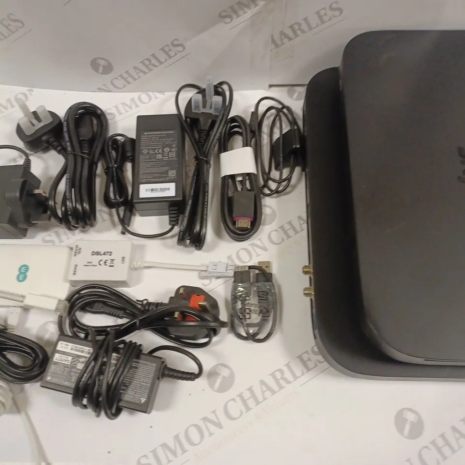 LOT OF ASSORTED TECH ITEMS TO INCLUDE SKY SET TOP BOXES AND VARIOUS CHARGERS AND CONNECTIVITY CABLES
