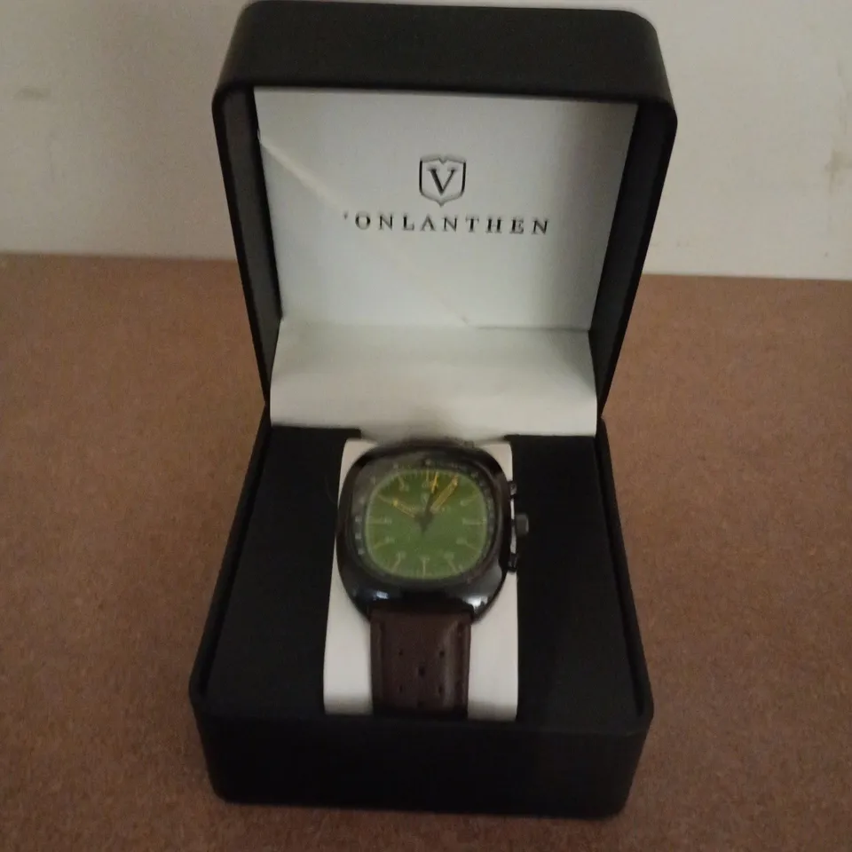VONLANTHEN AVIATION WATCH FEATURING A GREEN DIAL AND A BROWN PERFORATED LEATHER STRAP