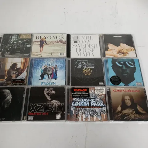 LOT OF APPROXIMATELY 60 ASSORTED CDS TO INCLUDE OZZY OSBOURNE, BEYONCE AND XZIBIT