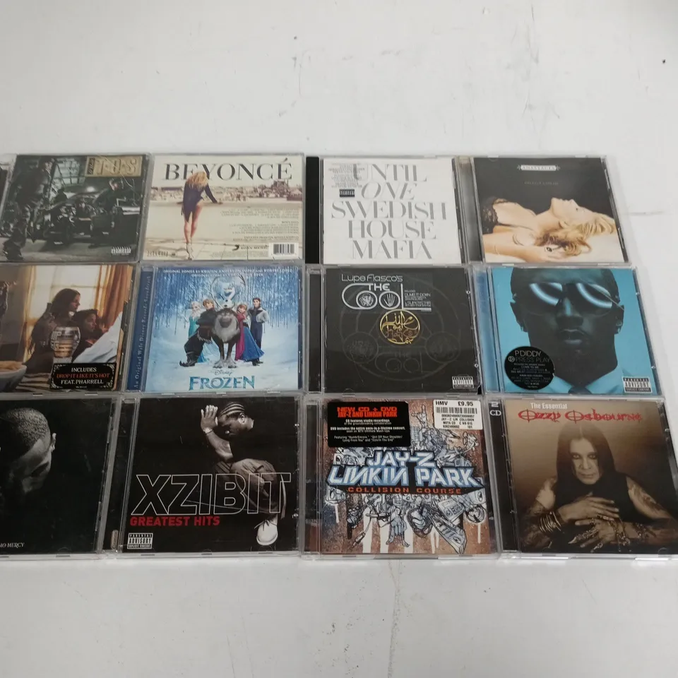 LOT OF APPROXIMATELY 60 ASSORTED CDS TO INCLUDE OZZY OSBOURNE, BEYONCE AND XZIBIT