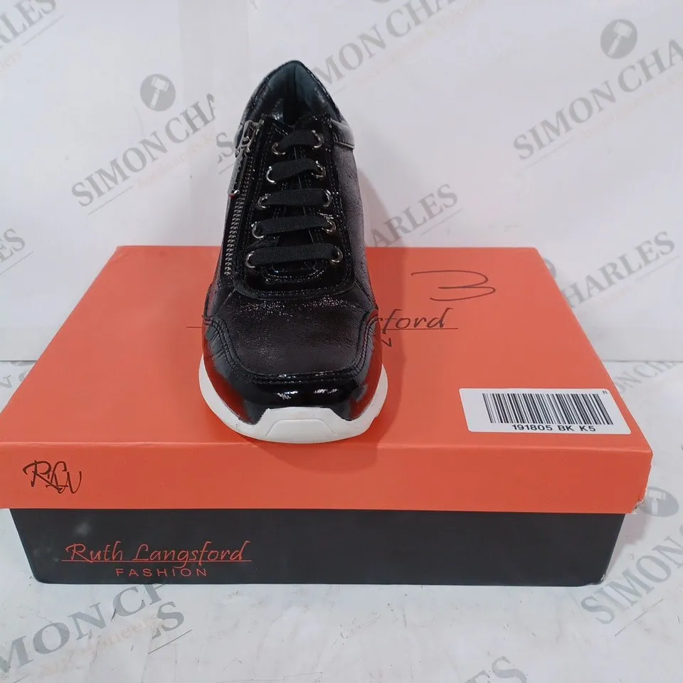BOXED PAIR OF RUTH LANGSFORD WEDGE TRAINERS IN BLACK SIZE 5