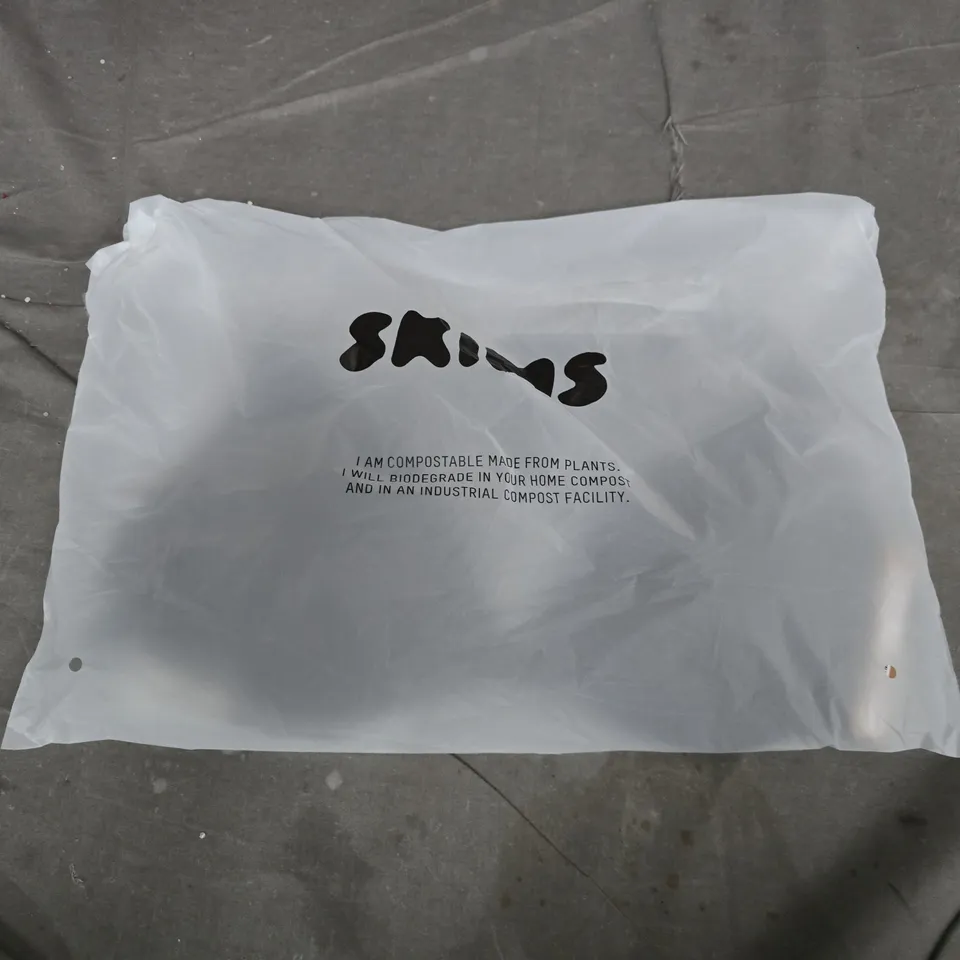 BAGGED SKIMS WIRELESS FORM SUPER PUSH-UP BRA IN ONYX - 32DDD