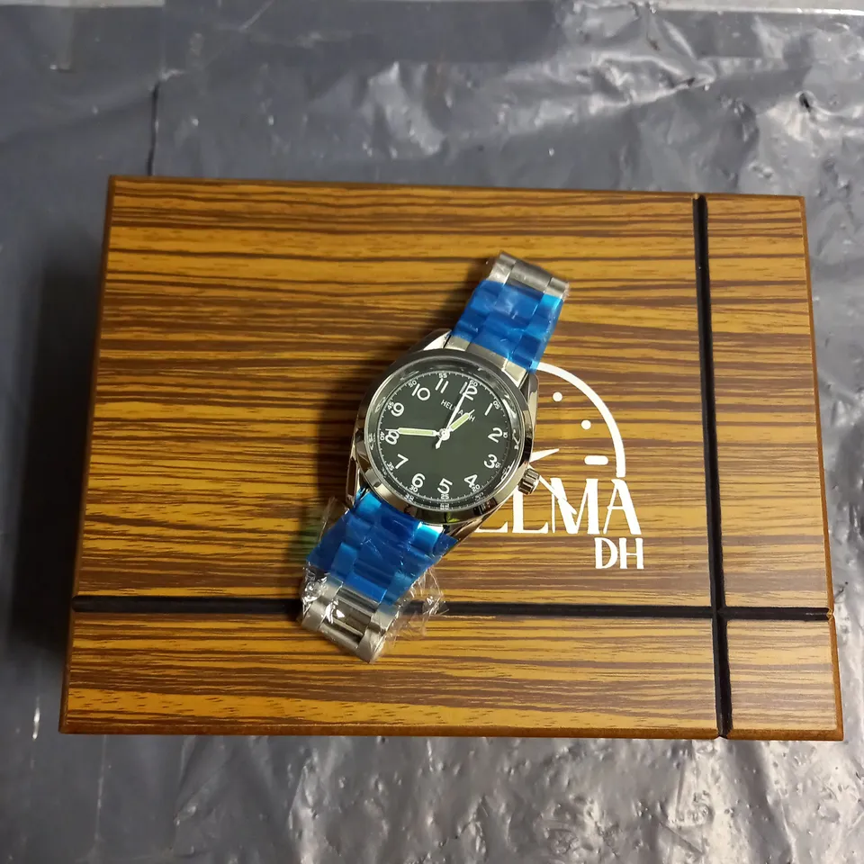 BOXED HELMA DH STAINLESS STEEL GREEN FACE WATCH