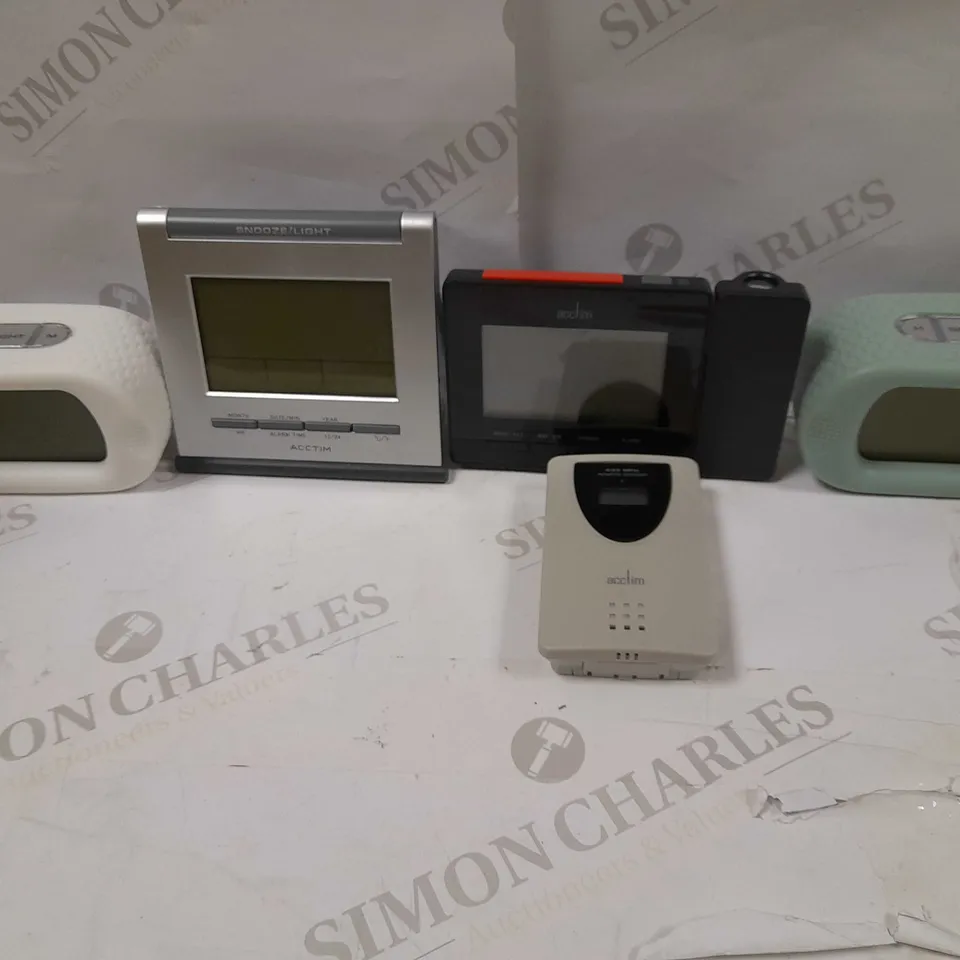 LOT OF APROX 4 ACCTIM DIGITAL CLOCKS