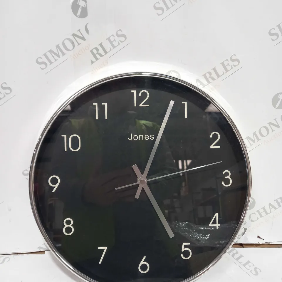 JONES BLACK FACE AND SLVER OUTLINE WALL CLOCK