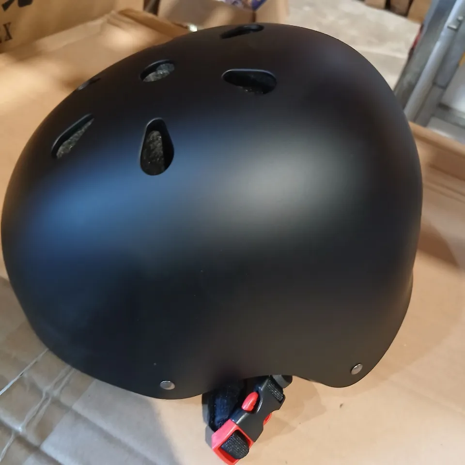 APPROXIMATELY 20 BLACK HELMETS