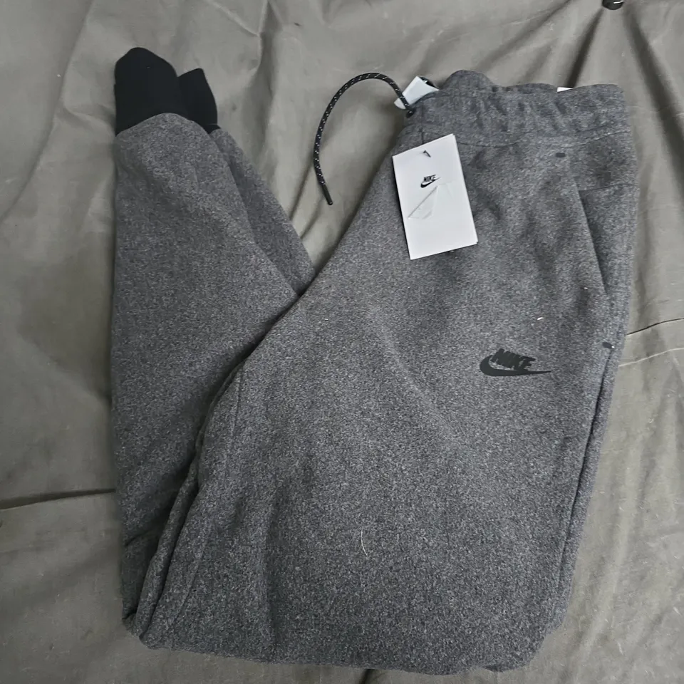 NIKE SLIM FIT TAPER LEG REGULAR LENGTH JOGGERS IN DARK GREY - SMALL