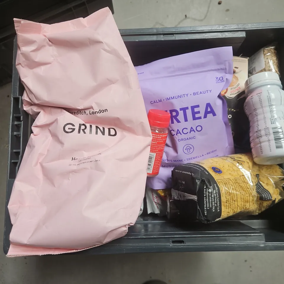 TOTE OF APPROXIMATELY 11 ASSORTED FOOD AND DRINK ITEMS TO INCLUDE GRIND COFFEE , MANGO WAFERS , CHICKEN SPICE , ETC