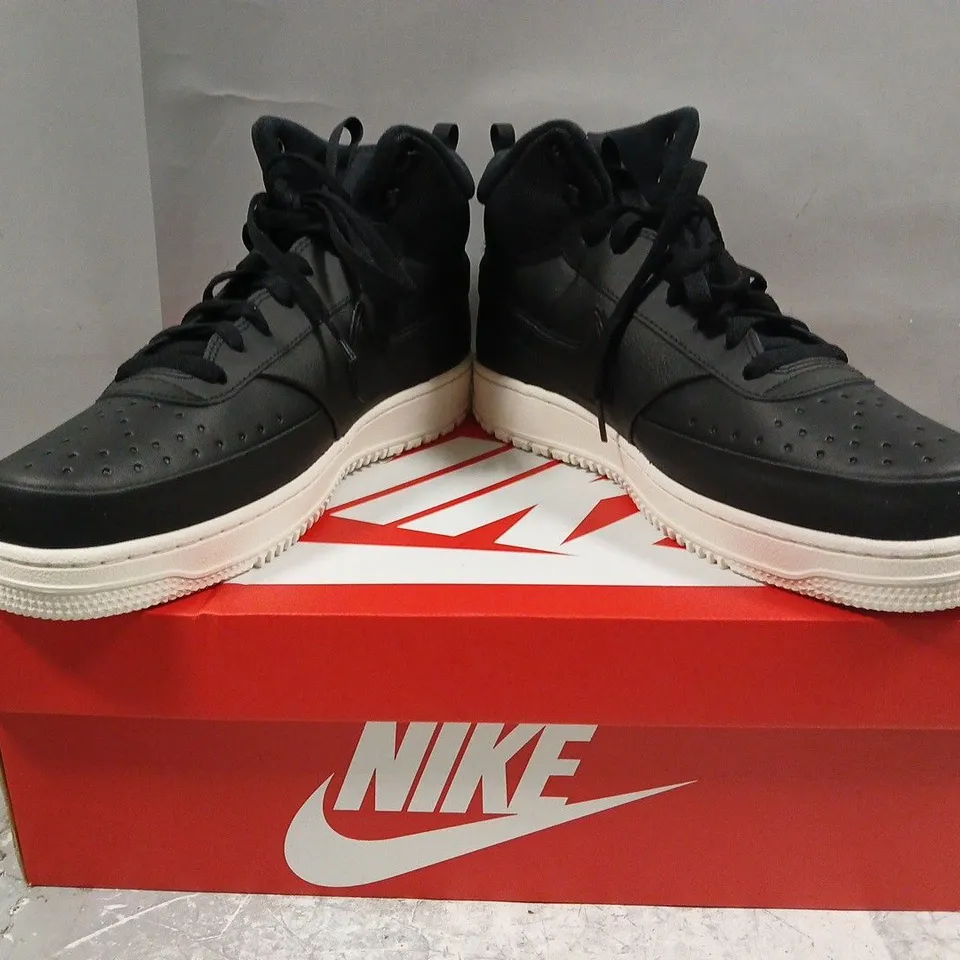 BOXED PAIR OF NIKE COURT VISION MID WNTR SHOES IN BLACK SIZE UK 11