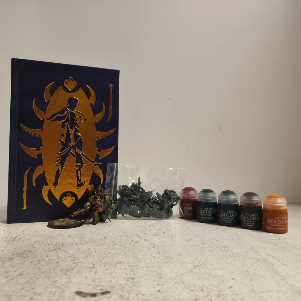 BOX OF ASSORTED WARHAMMER ITEMS TO INCLUDE SHADE OF KHAINE BY EVAN DICKEN, PAINTS, AND MINIATURES