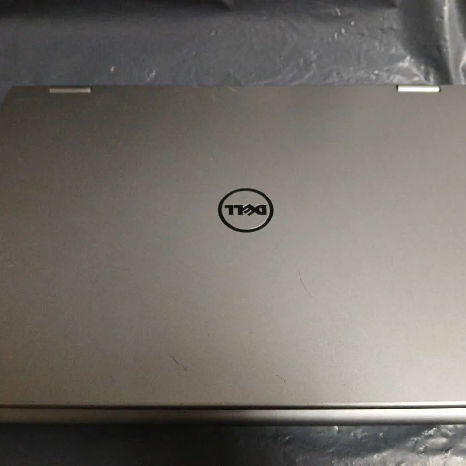 DELL 350* FOLDING LAPTOP IN SILVER - MODEL UNSPECIFIED 