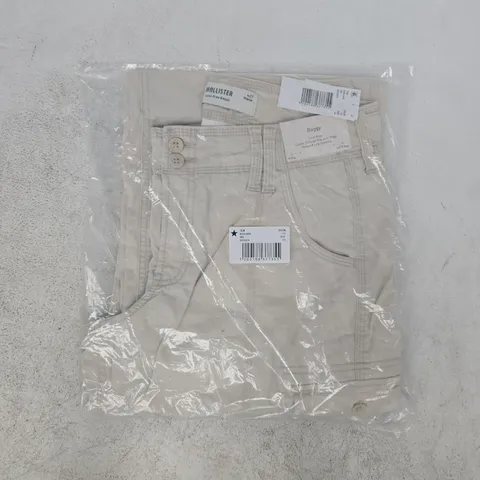 BAGGED HOLLISTER ADJUSTABLE WAIST LOW-RISE BAGGY CARGO PANTS IN BEIGE SIZE 27 REGULAR