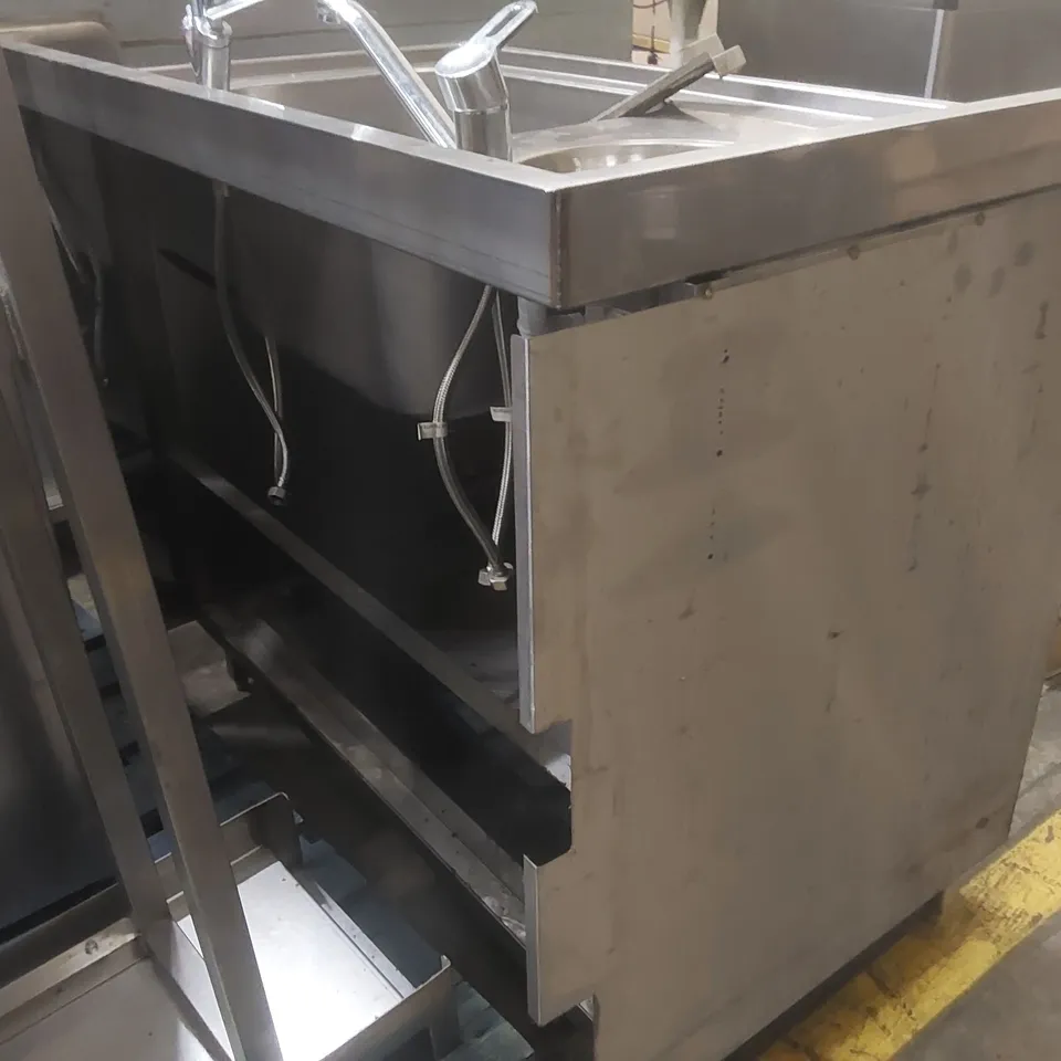 STAINLESS STEEL SINK UNIT WITH AN INTEGRATED BASE CABINET AND DUAL BASINS