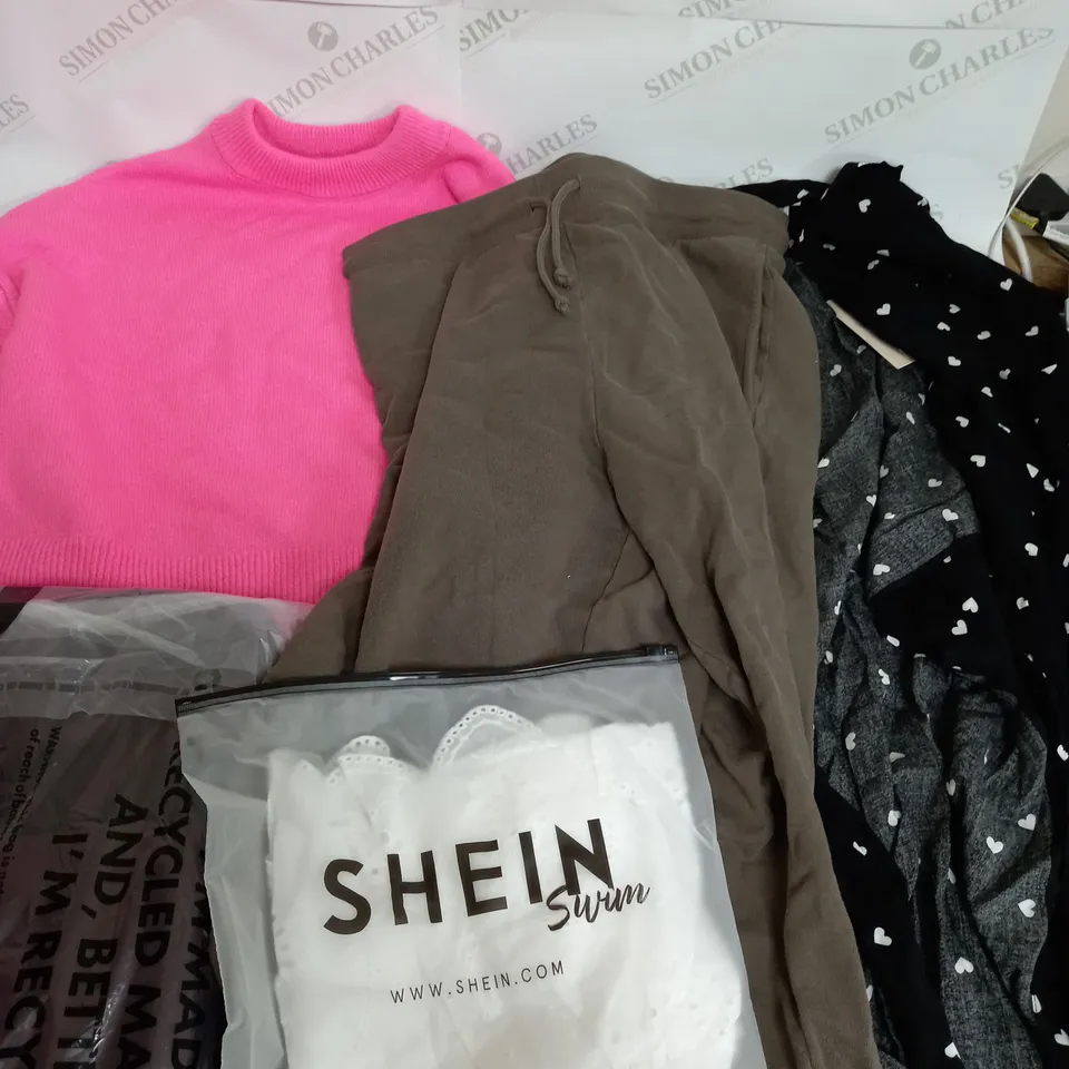 LARGE BOX OF ASSORTED CLOTHING ITEMS IN VARIOUS COLOURS AND SIZES INCLUDING TROUSERS , TOPS AND JUMPERS 