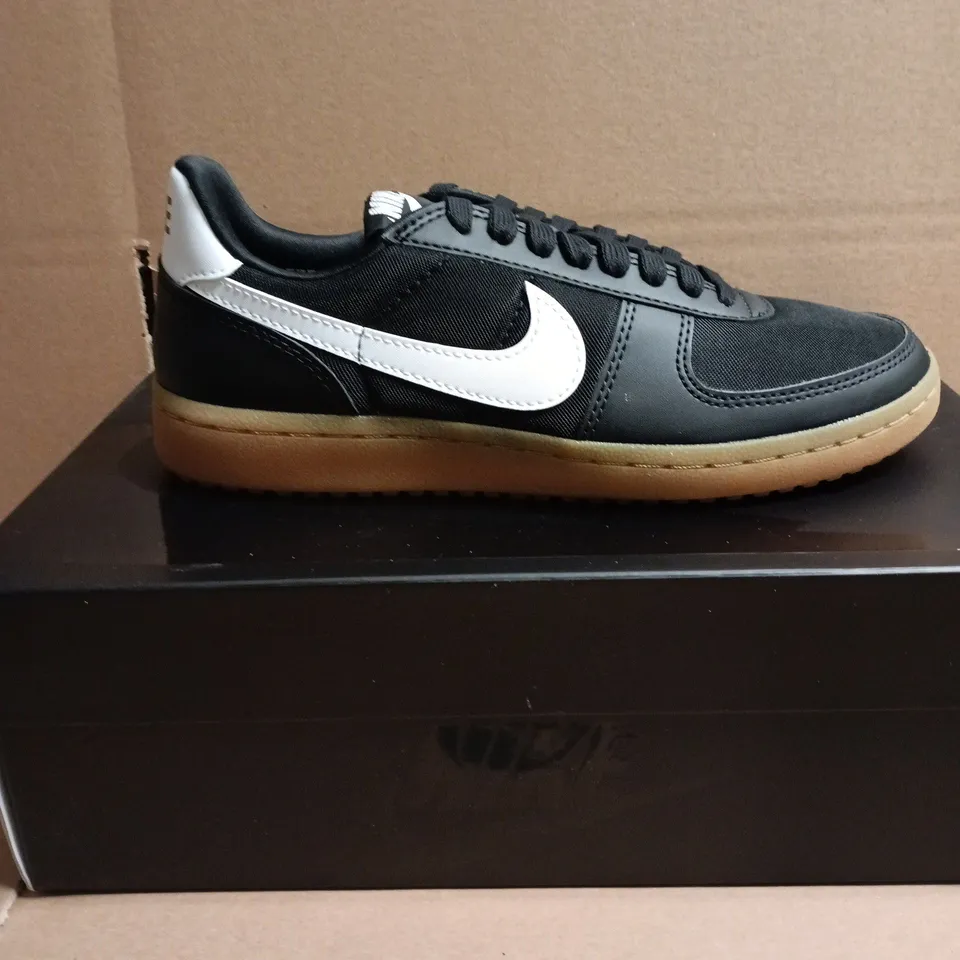 BOXED PAIR OF NIKE WOMENS FIELD GENERAL SNEAKERS – BLACK/WHITE – UK 6