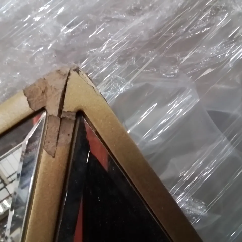 LARGE GOLD FRAME AND TRIM WALL MIRROR (SOME DAMAGE TO CORNERS)