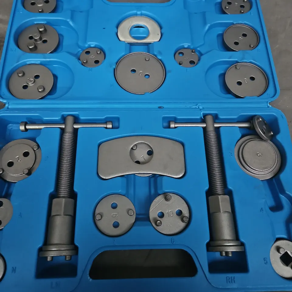 Blue plastic tool case with circular dies and twin screw clamps