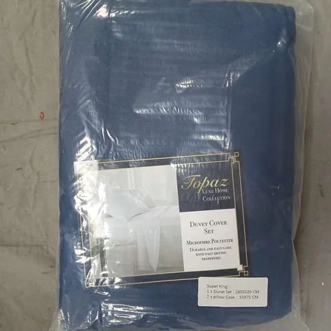 BOX OF APPROXIMATELY 10 TOPAZ LUXE HOME DUVET COVER SETS IN BLUE - SIZES MAY VARY - COLLECTION ONLY