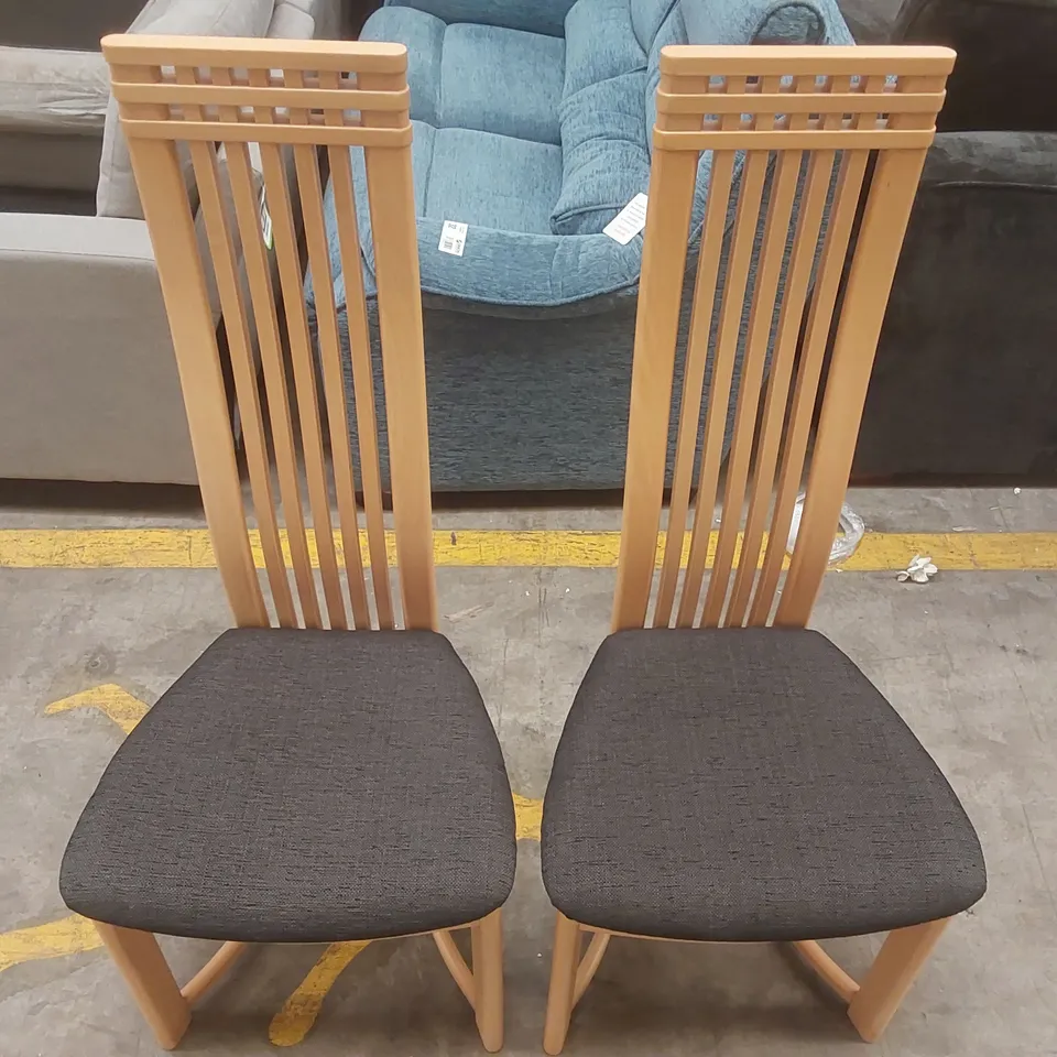 PAIR OF DESIGNER WOODEN HIGH BACK DINING CHAIRS WITH UPHOLSTERED PADDED SEATS