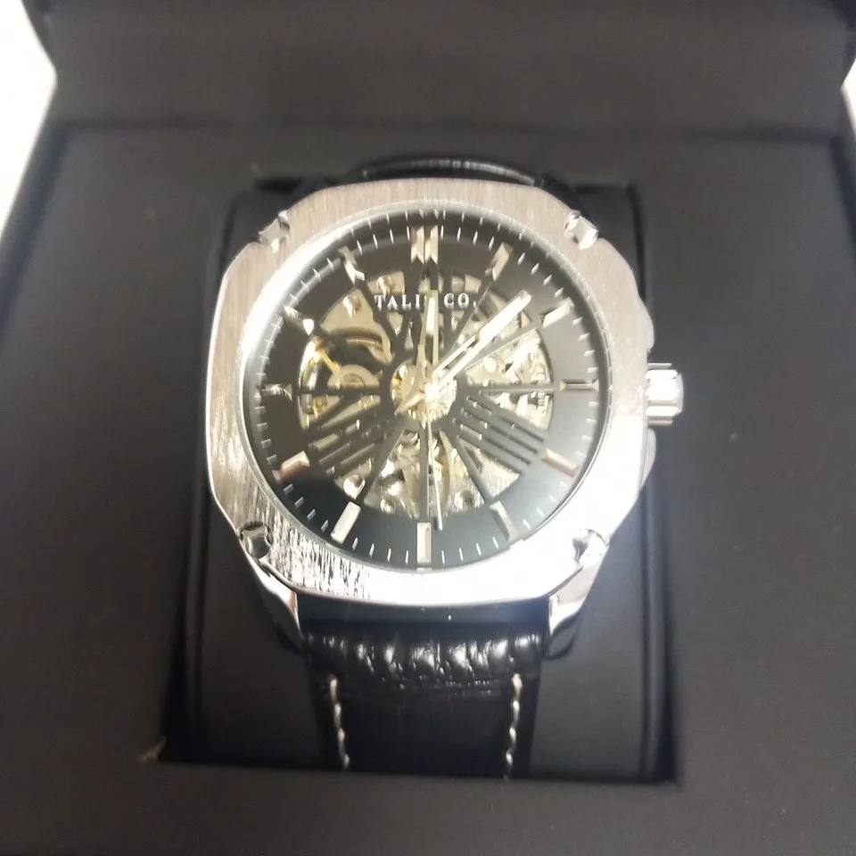 MEN’S TALIS CO  9185 AUTOMATIC SKELETON WATCH – BLACK DIAL – GOLD COLOUR CASE – GLASS EXHIBITION CASE BACK – LEATHER STRAP – RRP £575