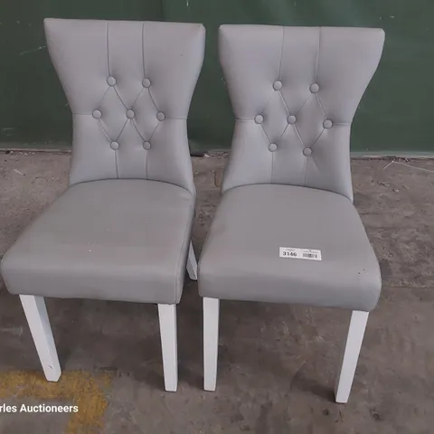 PAIR OF UPHOLSTERED BUTTONED BACK DINING CHAIRS GREY PU ON WHITE PAINTED LEGS 