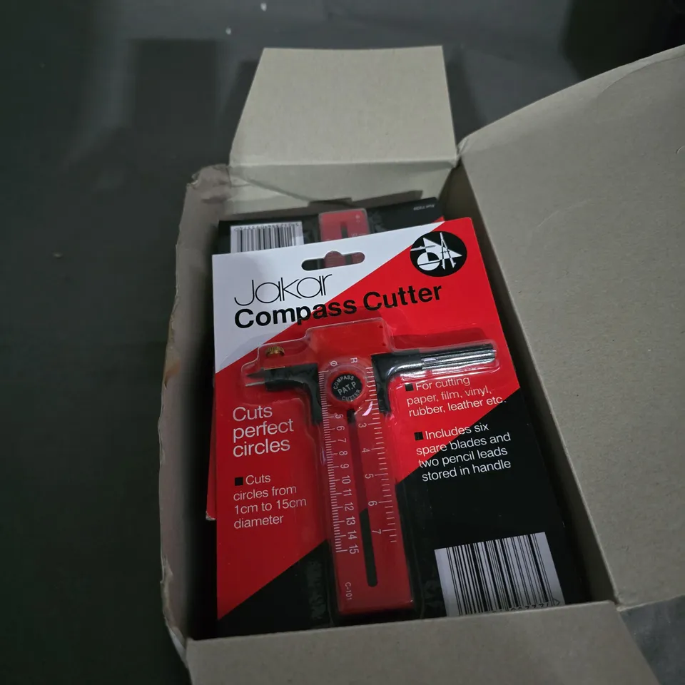 APPROXIATELY 8 ITEMS OF JAKAR COMPASS CUTTER WITH SIX SPARE BLADES AND TWO PENCIL LEADS .