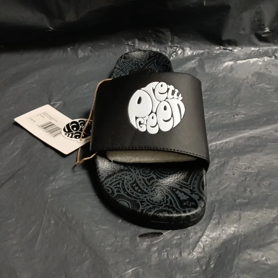 PAIR OF PRETTY GREEN MOCKU SLIDERS IN BLACK SIZE 9