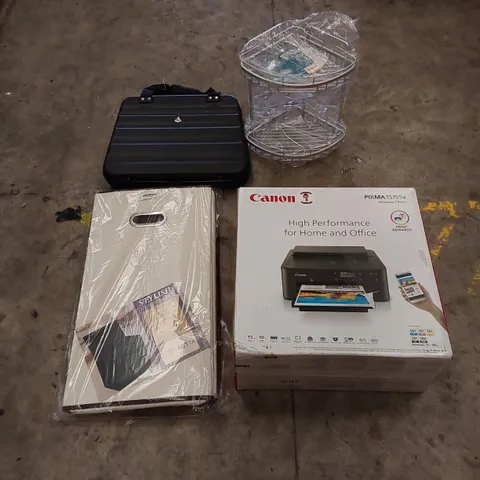 PALLET OF ASSORTED HOUSEHOLD ITEMS AND CONSUMER PRODUCTS. INCLUDES CANON WIRELESS PRINTER, TRAVEL CASE, LAUNDRY BASKET, TOILET SEAT, BOXED FURNITURE ETC