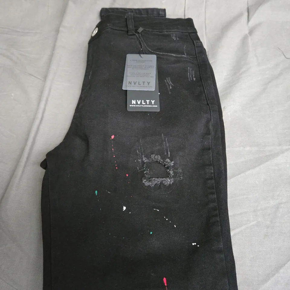 NVLTY PATCHWORK PAINT JEANS SIZE W34